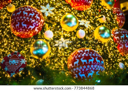 Decoration on Christmas tree with bokeh background