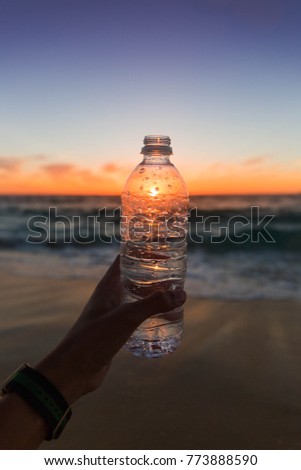 Beautiful sunset, with a water bottle 