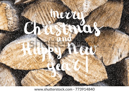 Festive Greeting Card Merry Christmas and Happy New Year, text with christmas wooden background
