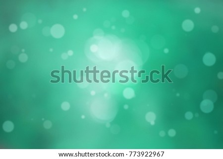 Abstract Green christmas background with bokeh lights