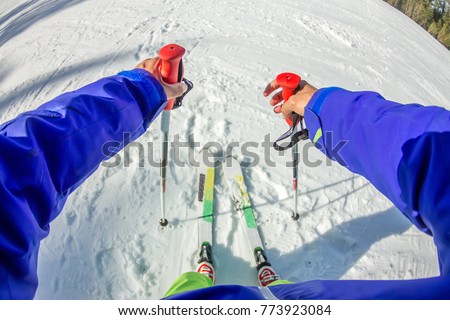 Skier first-person view of the ski snow slope. Royalty-Free Stock Photo #773923084