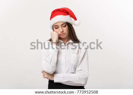 Business Concept - Modern caucasian business woman in christmas theme with serious thoughtful pose.