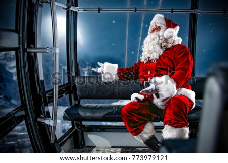 Red old santa claus and red clothes. Photo of winter time. 