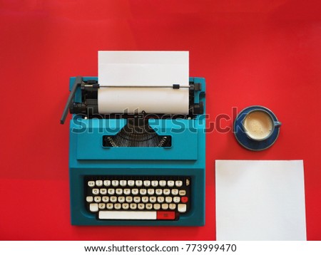 Top view vintage Typewriter on red background,copy space.