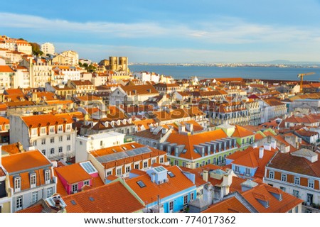 Skyline of Lisbon with famous Lisbon Cathedral at sunset. Portugal