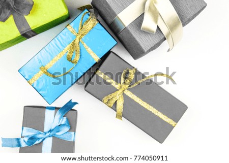 Big pile of colorful wrapped gift boxes isolated on white background. Mountain gifts.