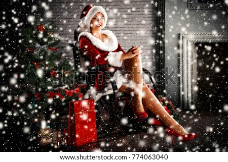 Woman and christmas time. Photo with snowflakes 