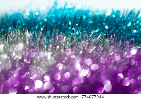 Christmas holidays backgrounds tinsel photo. Blurred lights amazing happy party style De focused new year decoration.