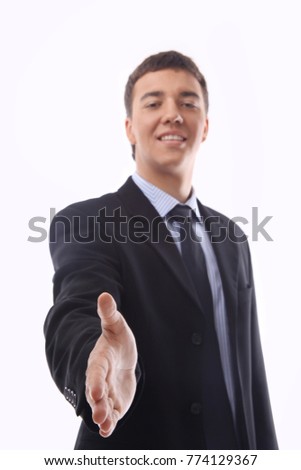 businessman offering to shake your hand