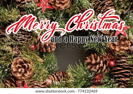 Flower arrangement; red berries; pine cones; branches in various shades of green; stars; ambiance christmas with text merry christmas and a happy new year