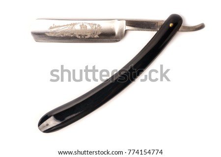 Vintage razor engraved on the blade, isolated on white background Royalty-Free Stock Photo #774154774