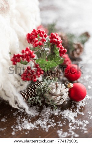 
red Christmas decorations. the bumps in the snow. Christmas background
