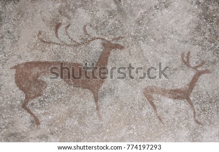 drawing of a deer on a cave wall