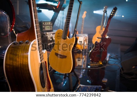 guitars stage composition in a vintage concert hall