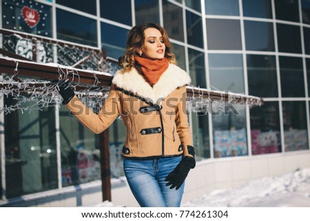 beautiful fashionable girl in winter