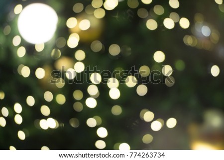 Defocused background, Light night bokeh abstract background, Glitter vintage lights background. Abstract Gold bokeh Christmas background. lens flare reflection beautiful circle glitter.