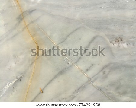 Texture and pattern of cracks on the marble slab.