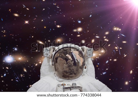 Astronaut and light. Science theme.  The elements of this image furnished by NASA.
