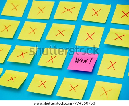 Color stickers and one selected win on blue background