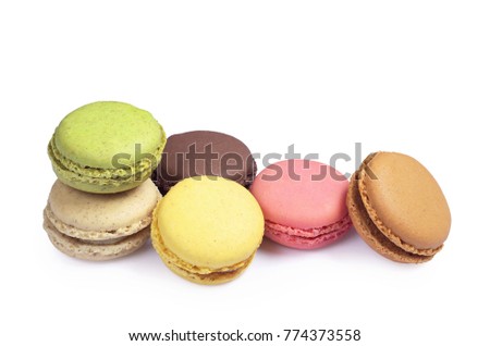 Classic mini macaroons on white background close up