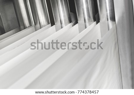 Roller layers of Paper in Printing machine, Newspaper roto production line in Print shop. Rolled Up, Printing Out