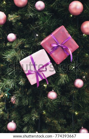 Picture of New Year's background with fir-tree balls, purple boxes