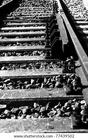 Black and white photo of an old rail