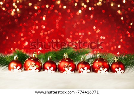 Beautiful christmas balls on the red background
