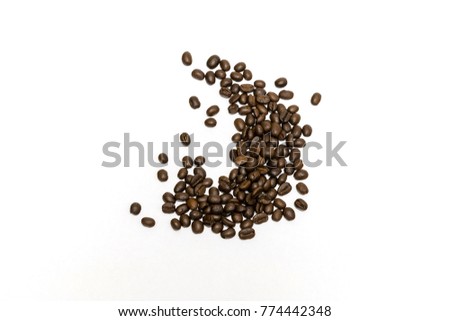 Roasted coffee beans isolated on white background. Close up image and high resolution.