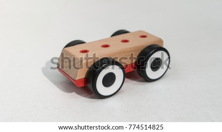 wooden toy cars isolated on white background for concept.