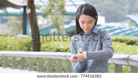 Woman use of smart watch 