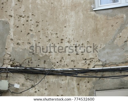 Bullet holes in wall
