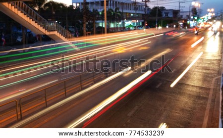 Beautiful long light of the car on the street in the big city,need blur picture