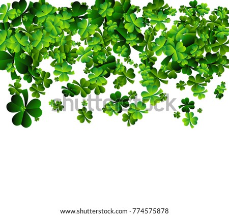 Background with sprayed clover leaves or shamrocks. Saint Patricks day Background.