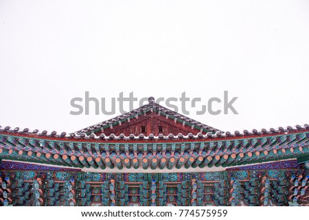 Korean traditional Korean-style house roof covered in snow