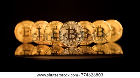 Bitcoin BTC the new virtual internet Cryptocurrency isolated on black background. Concept of future currency.