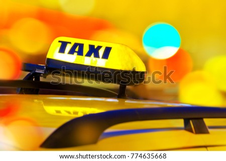 Public transport and transportation - Yellow taxi car service, sign on the roof, Cabs in Prague, Czech republic