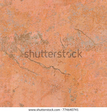 Orange cracked wall seamless texture or background