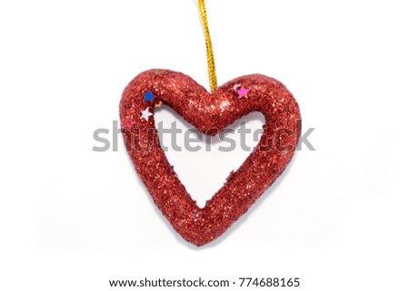 New Year's toys in the form of a heart. On a white background.