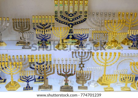 hanukkah candlesticks on Jerusalem souvenir store, the inscription "Jerusalem"