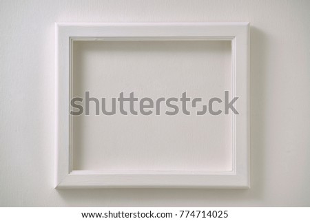 empty white photo frame             