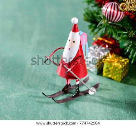 christmas decoration, skating santa claus isolated on green 

background
