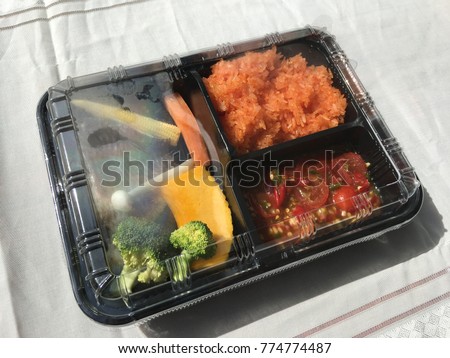 Lunch box in the northeast Thailand. Royalty-Free Stock Photo #774774487