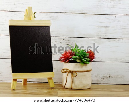 empty space for copy black board on white brick wall texture background