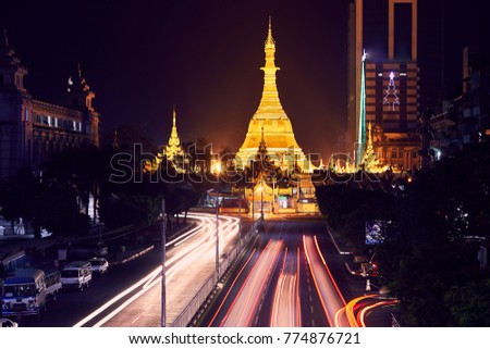 Shwedagon Temple at night, street view, long exposure time Royalty-Free Stock Photo #774876721