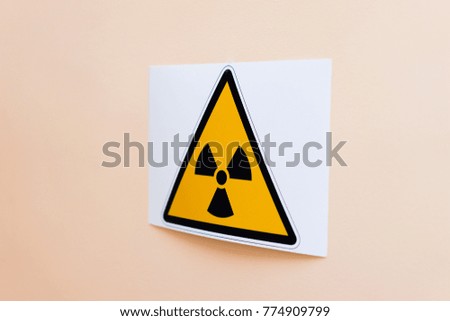 sign of radiation hazard hanging on the wall