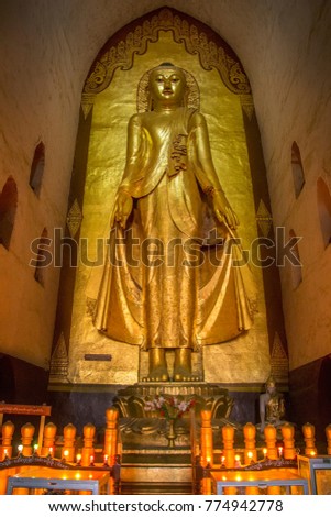 Buddha image in the Ananda Buddhist Temple in the ancient city of Bagan in Myanmar (Burma). Dates from 1105AD.