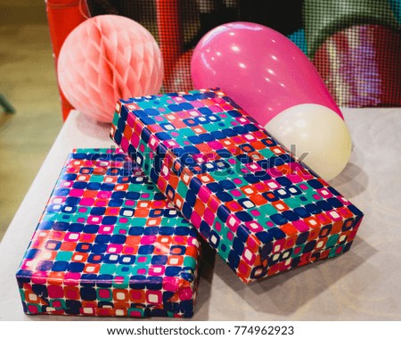 Presents and balloons. Birthday decoration. Colorful. Anniversary gifts. 