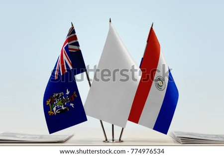 Flags of South Georgia and
South Sandwich Islands and Paraguay with a white flag in the middle