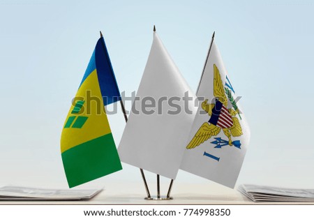 Flags of Saint Vincent and the Grenadines and U.S. Virgin Islands with a white flag in the middle
